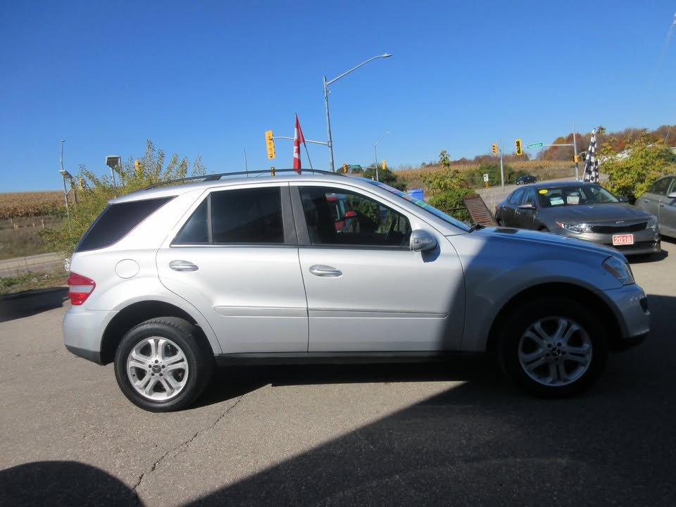 Side profile of the silver ML 320 CDI on factory alloy wheels