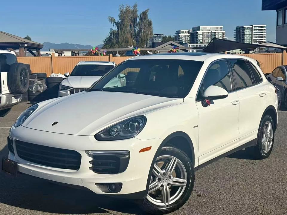 White 2016 Porsche Cayenne Diesel, front three-quarter view on a dealer lot in Richmond, BC